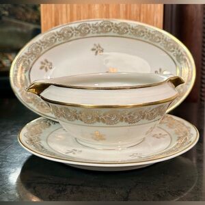 Limoges vintage gravy boat and serving tray set.